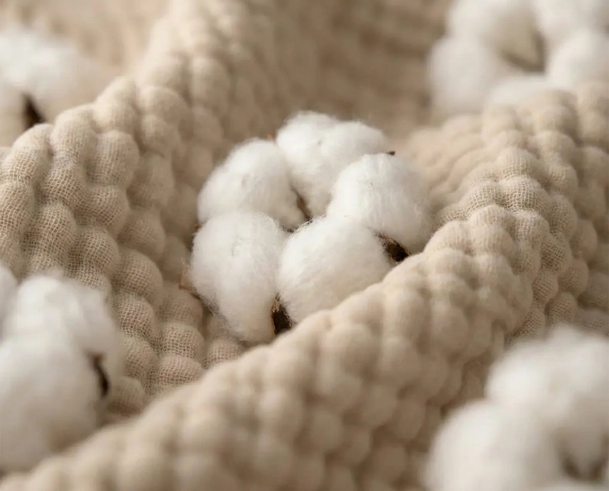 Finished muslin blanket being pre-washed and checked by hand