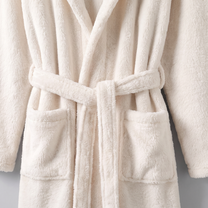 Ivory robe belt and patch pocket detail