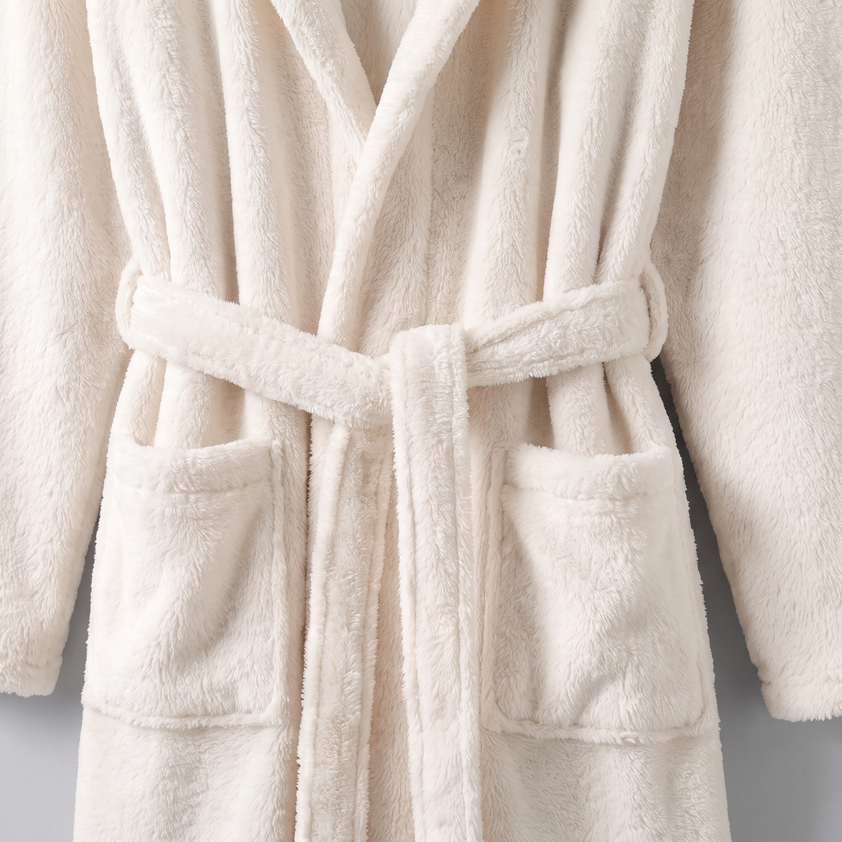 Ivory robe belt and patch pocket detail