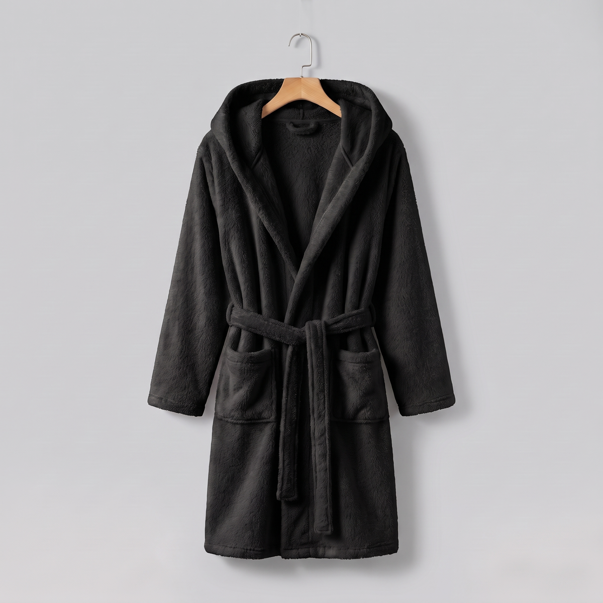 Black Cloud Plush Robe on wooden hanger against cool grey background