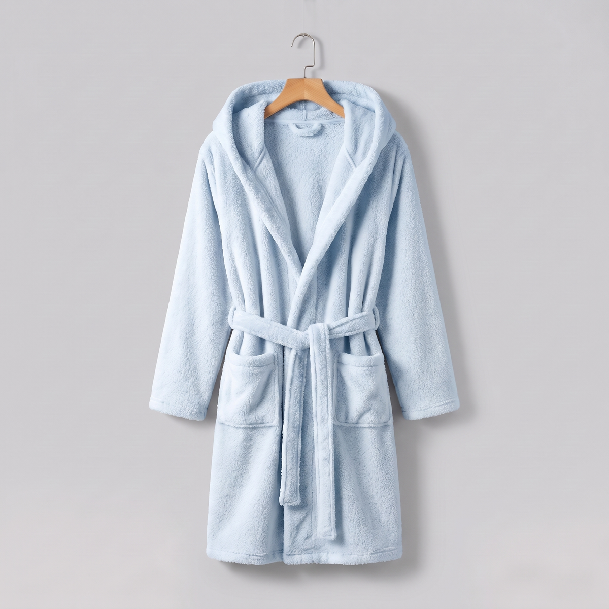 Sky Blue Cloud Plush Robe on wooden hanger against cool grey background